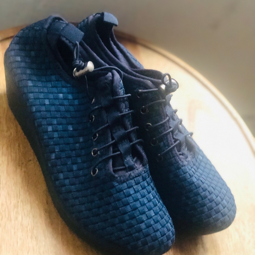 Steve Madden blue cross weave wedge sneakers.